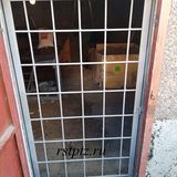 Дверь решётчатая